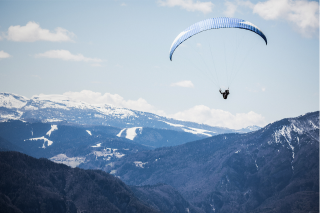 sky-diving over mountains